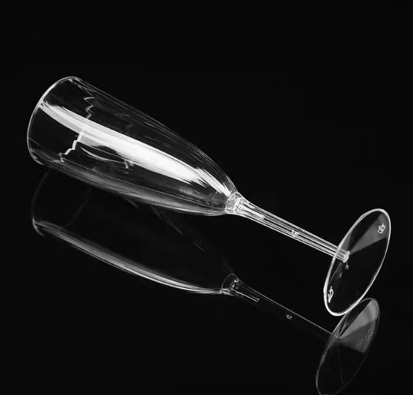 Side view of the 5oz plastic champagne flute, showcasing its sleek and sturdy construction ideal for celebrations.