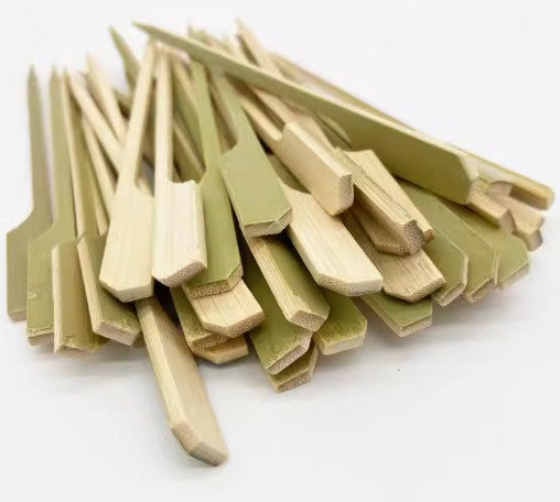 Close-up of pointed bamboo skewer sticks used for party food
