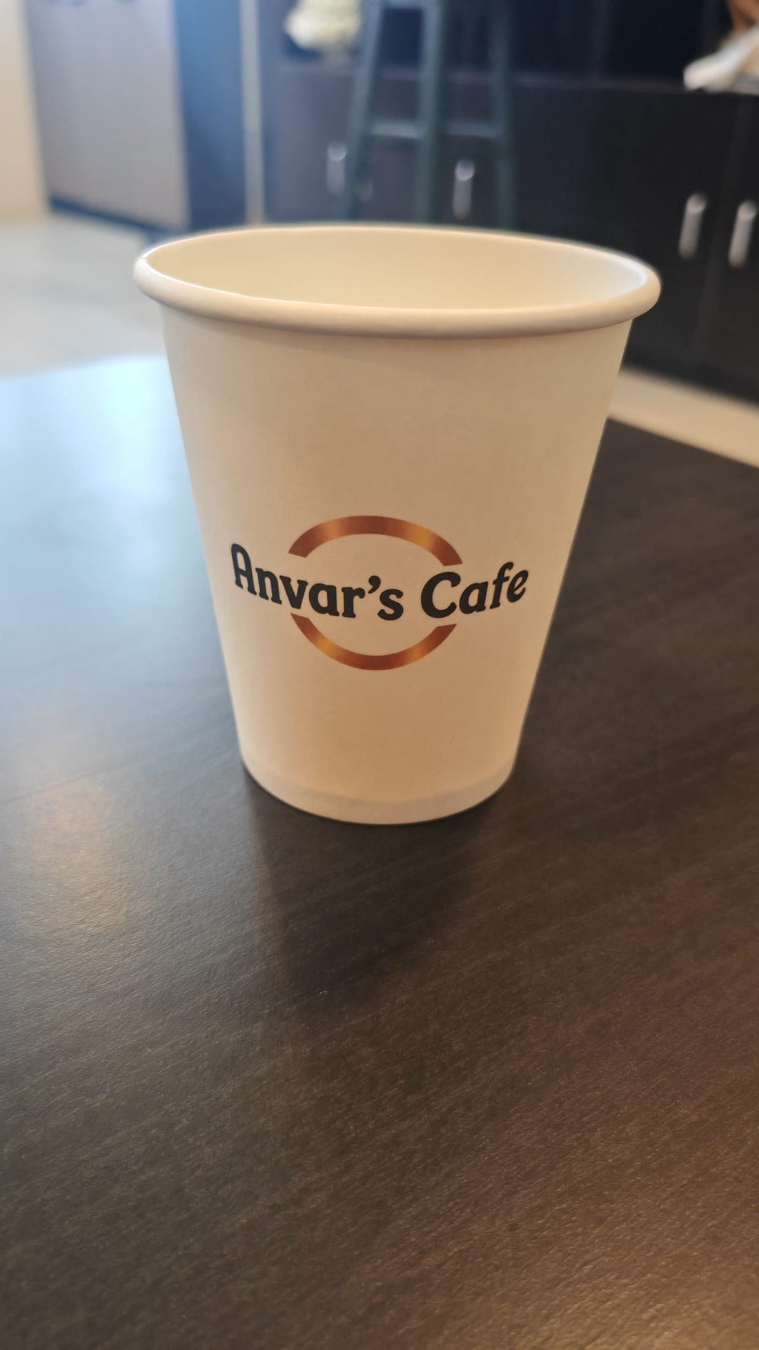 Custom printed 10 oz paper cup for Anvar's Cafe in Singapore