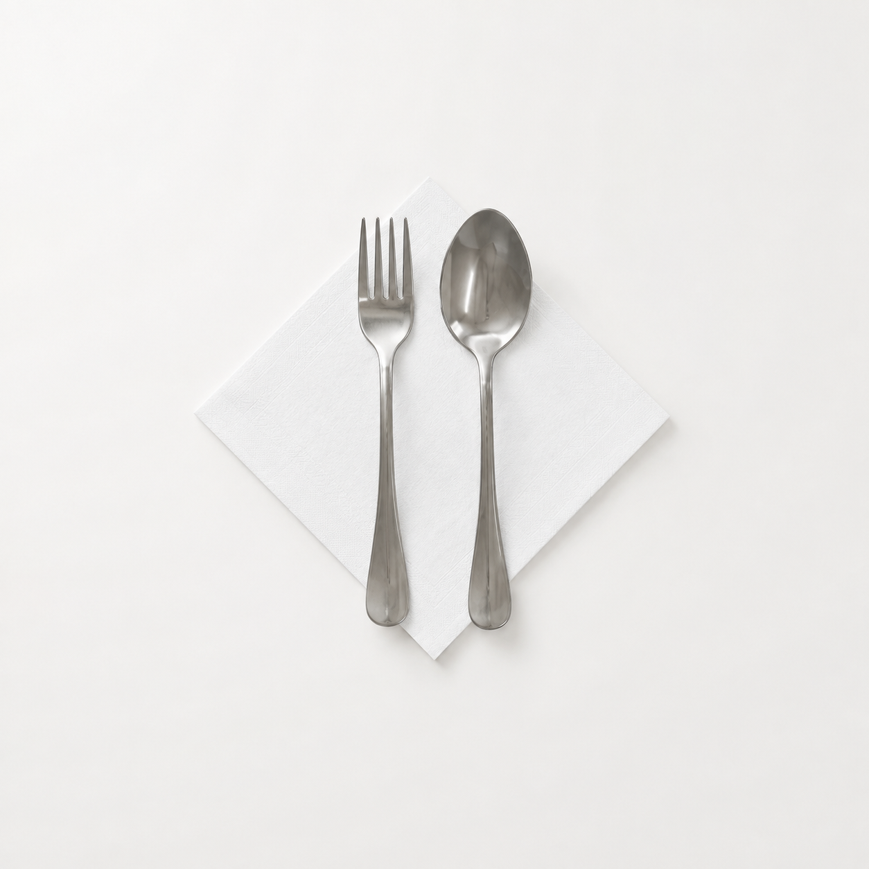 White 2-ply cocktail napkin with fork and spoon