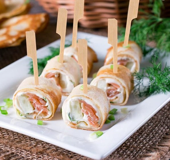 Close-up of pointed bamboo skewer sticks used for party food