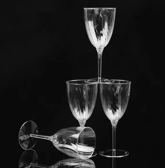 Disposable 210 ml plastic wine glass from Tang's Plastic Supply.​
