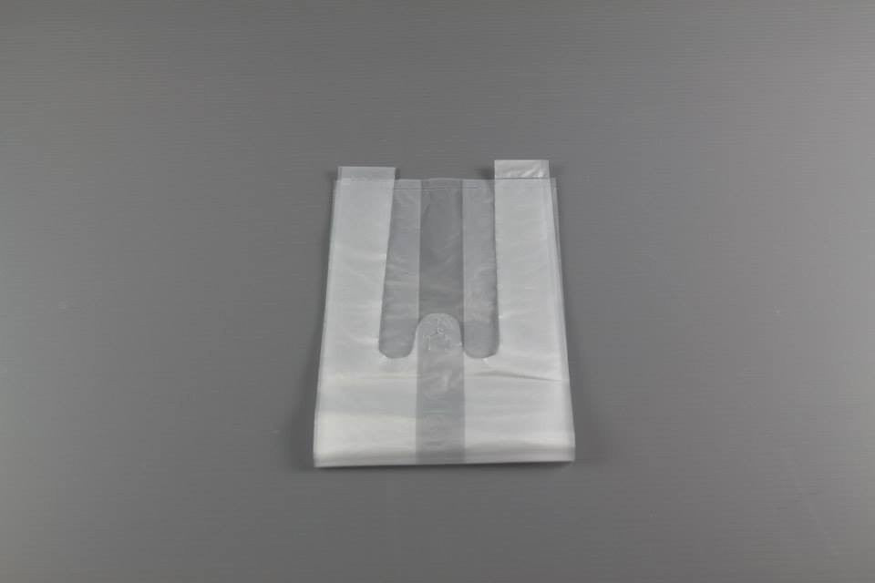 Transparent 1 cup carrier plastic bag holding a takeaway drink.
